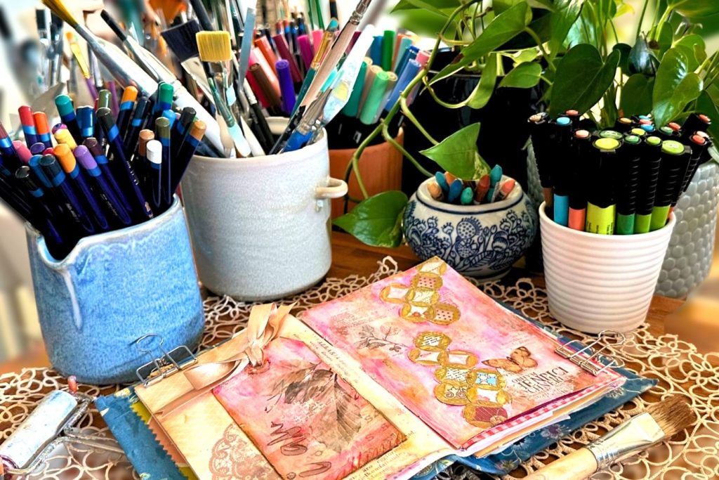 Art supplies for mixed media artwork.